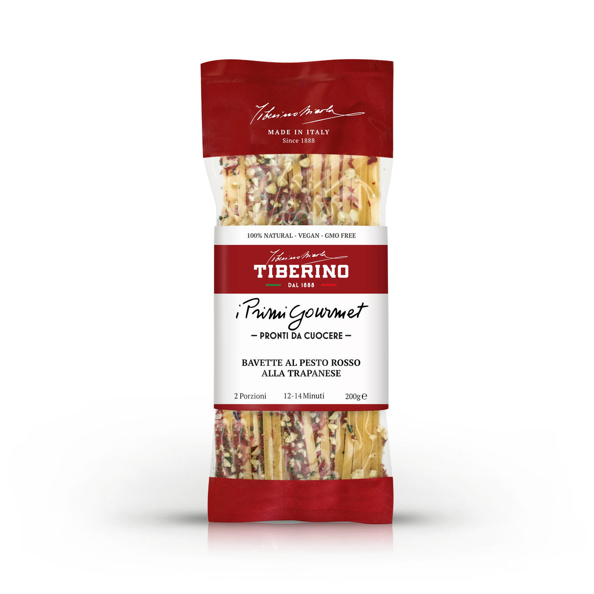 Confezione trasparente e rossa di Bavette al Pesto Rosso alla Trapanese Tiberino 1888, 200g, con pasta e condimento visibili.