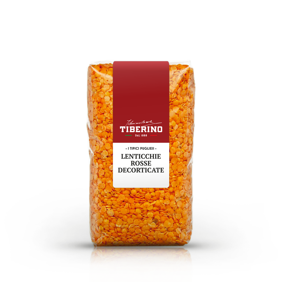 Sacchetto trasparente di lenticchie rosse decorticate Tiberino 1888 con etichetta rossa e bianca.