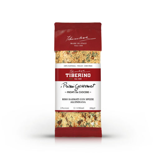 Confezione rossa Tiberino 1888 "I Primi Gourmet" Riso Basmati con Spezie all'Indiana, 200g, ingredienti visibili.