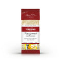 Confezione rossa e trasparente di Risotto con Zafferano alla Milanese Tiberino 1888, 200g, con riso visibile.