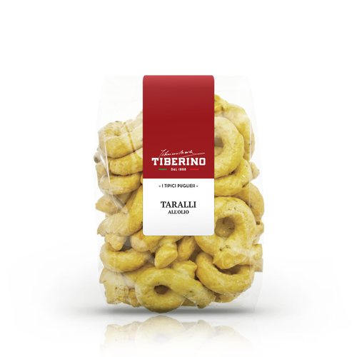 Confezione trasparente di Taralli Pugliesi all'olio Tiberino 1888, con etichetta rossa e bianca.