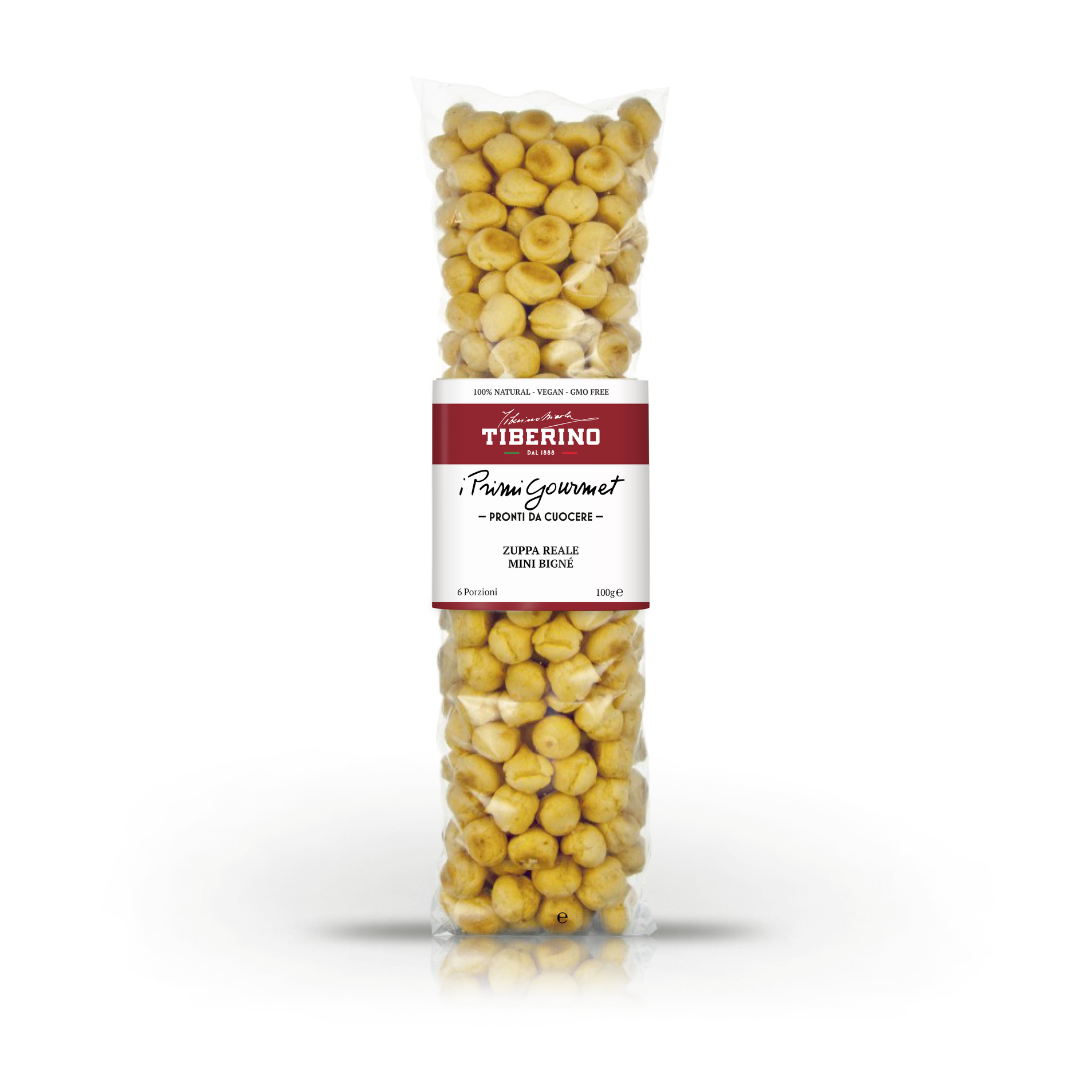 Sacchetto trasparente di Zuppa Reale Mini Bignè Tiberino 1888, con etichetta rossa e bianca, 100g.
