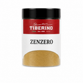 Barattolo trasparente con coperchio nero e etichetta rossa Tiberino 1888, contenente zenzero in polvere beige chiaro.