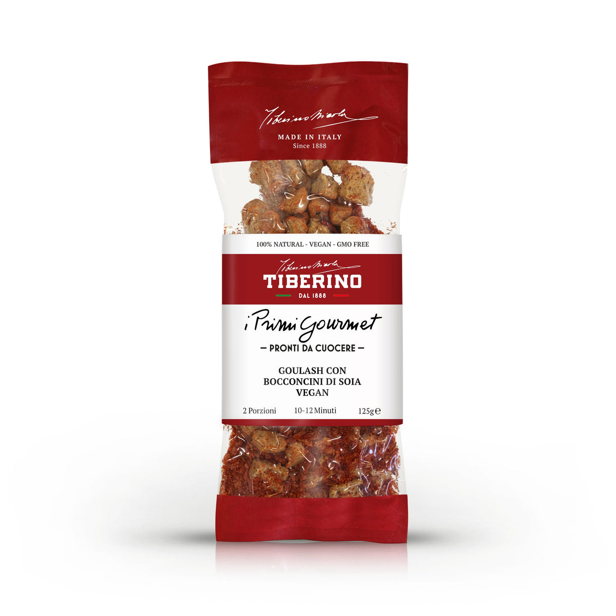 Confezione verticale Tiberino 1888 "I Primi Gourmet" di goulash vegano con bocconcini di soia, 125g, sfondo bianco.