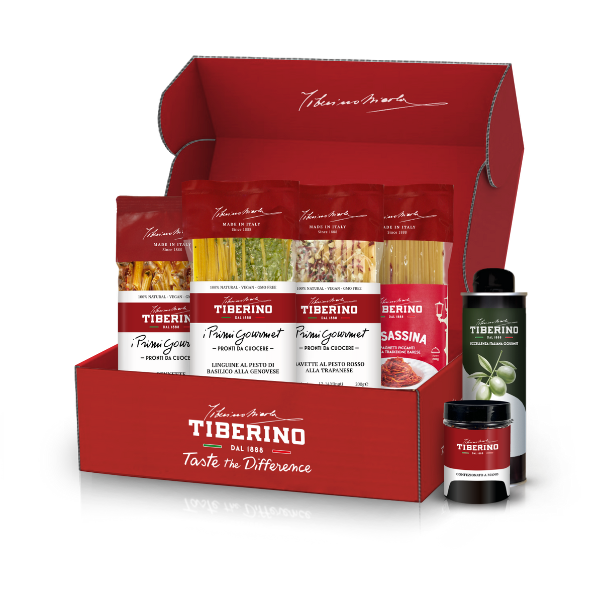 Cofanetto regalo rosso Tiberino 1888 con cinque pacchi di pasta, una bottiglia di olio d'oliva e un vasetto di salsa.